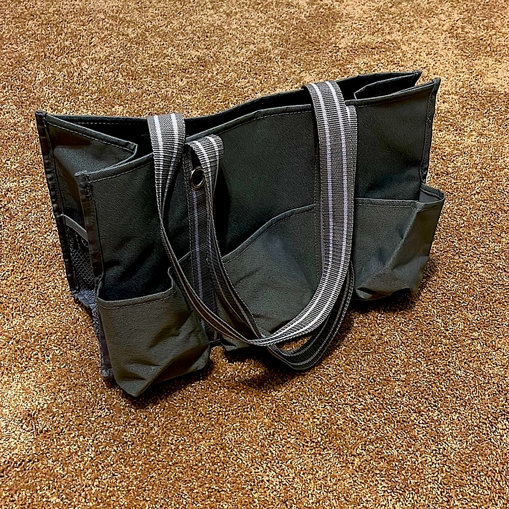 Thirty-One Utility Tote. Gray w/gray and white stripe handles.  7 total pockets.